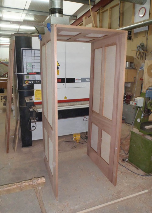 Walk-through bookcase frame construction