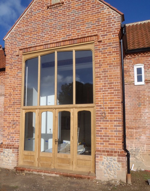 Barn door and windows overhead